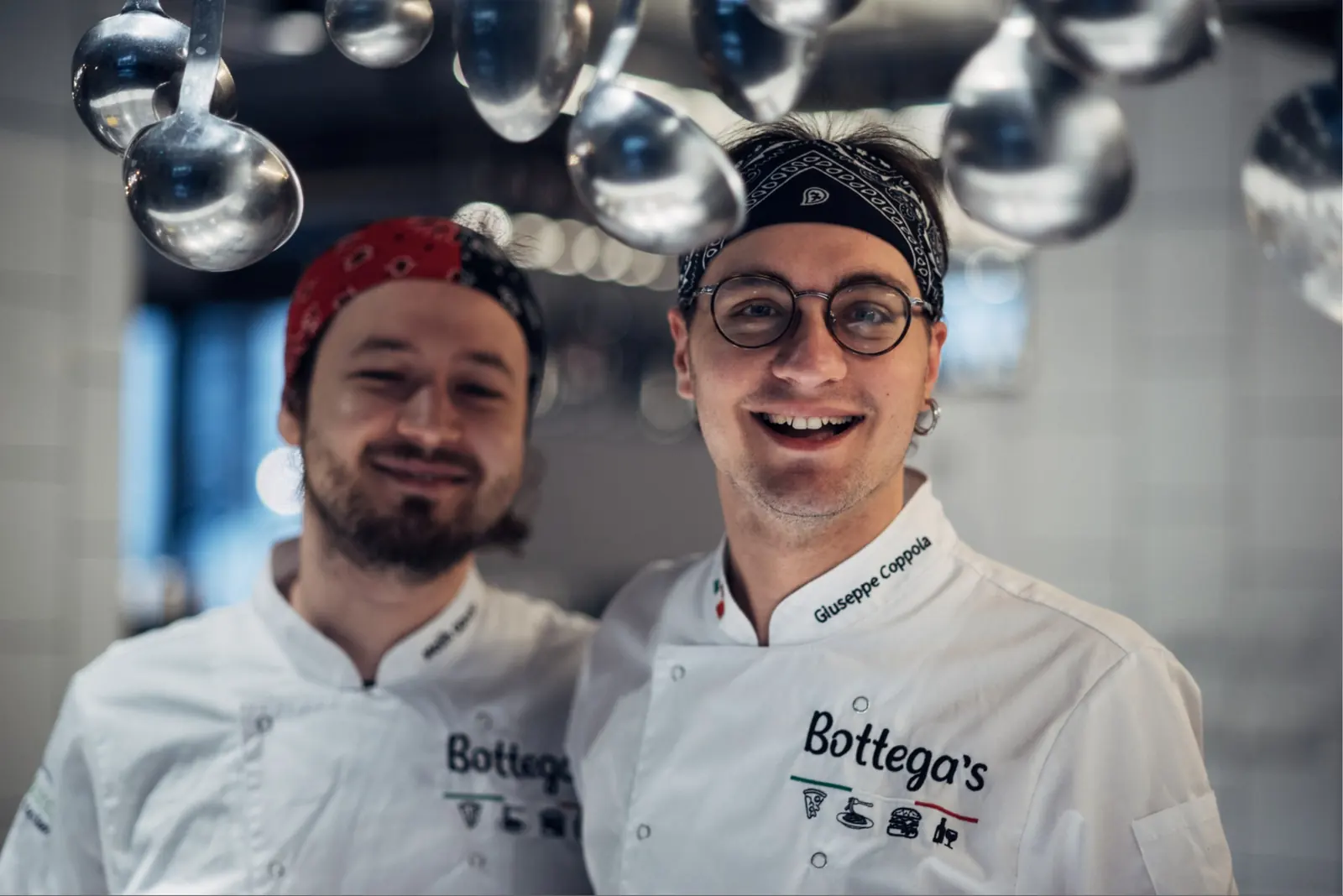 Bottegas pizzaioli in the kitchen, wearing Bottega's chef jackets